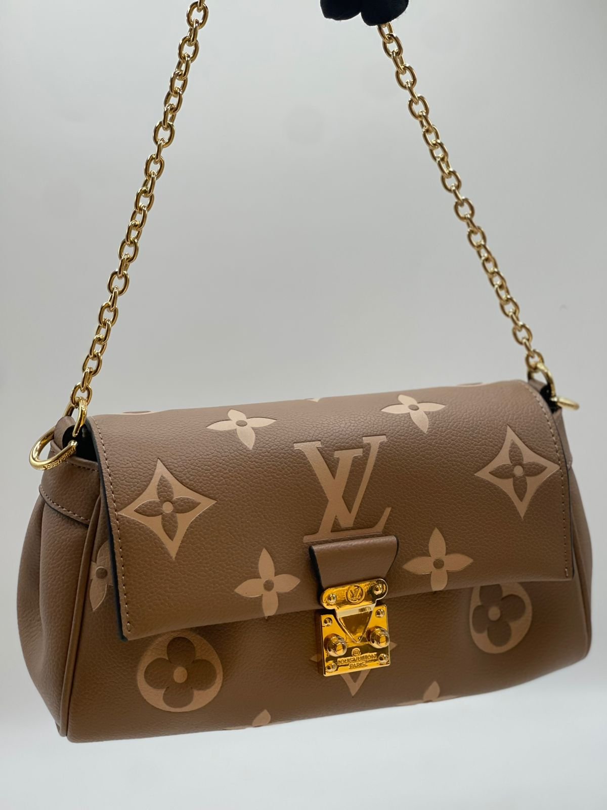 Louis Vuitton Pochette Métis East West Monogram Empreinte Leather