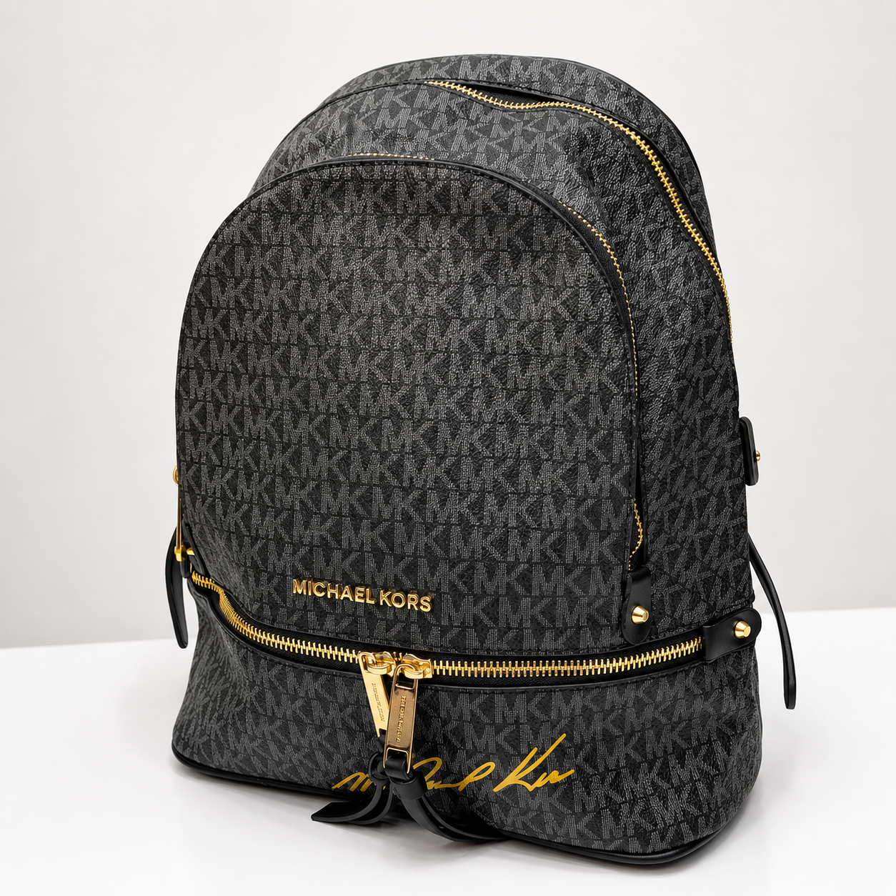 Michael Kors Signature Monogram Backpack