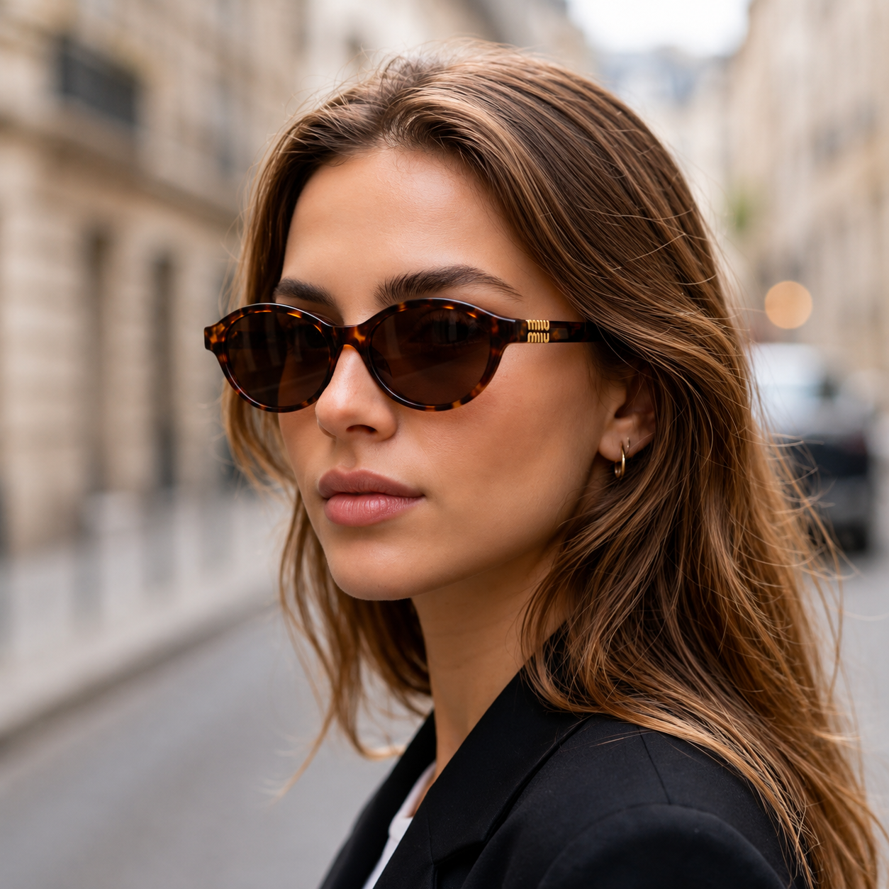 Miu Miu Classic Oval Sunglasses