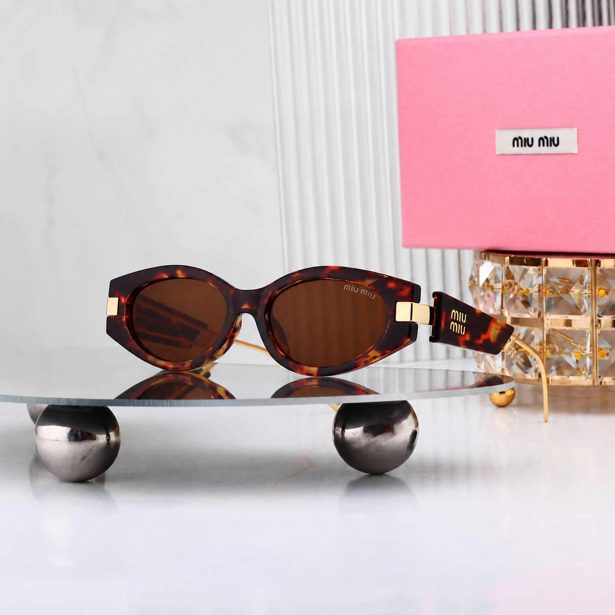 Miu Miu Oval Fashion Sunglasses