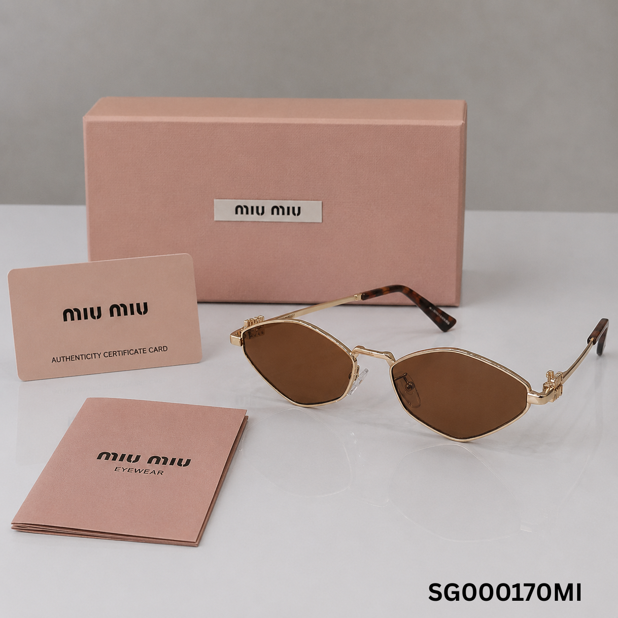 Miu Miu Gold Slim Oval Gradient Sunglasses