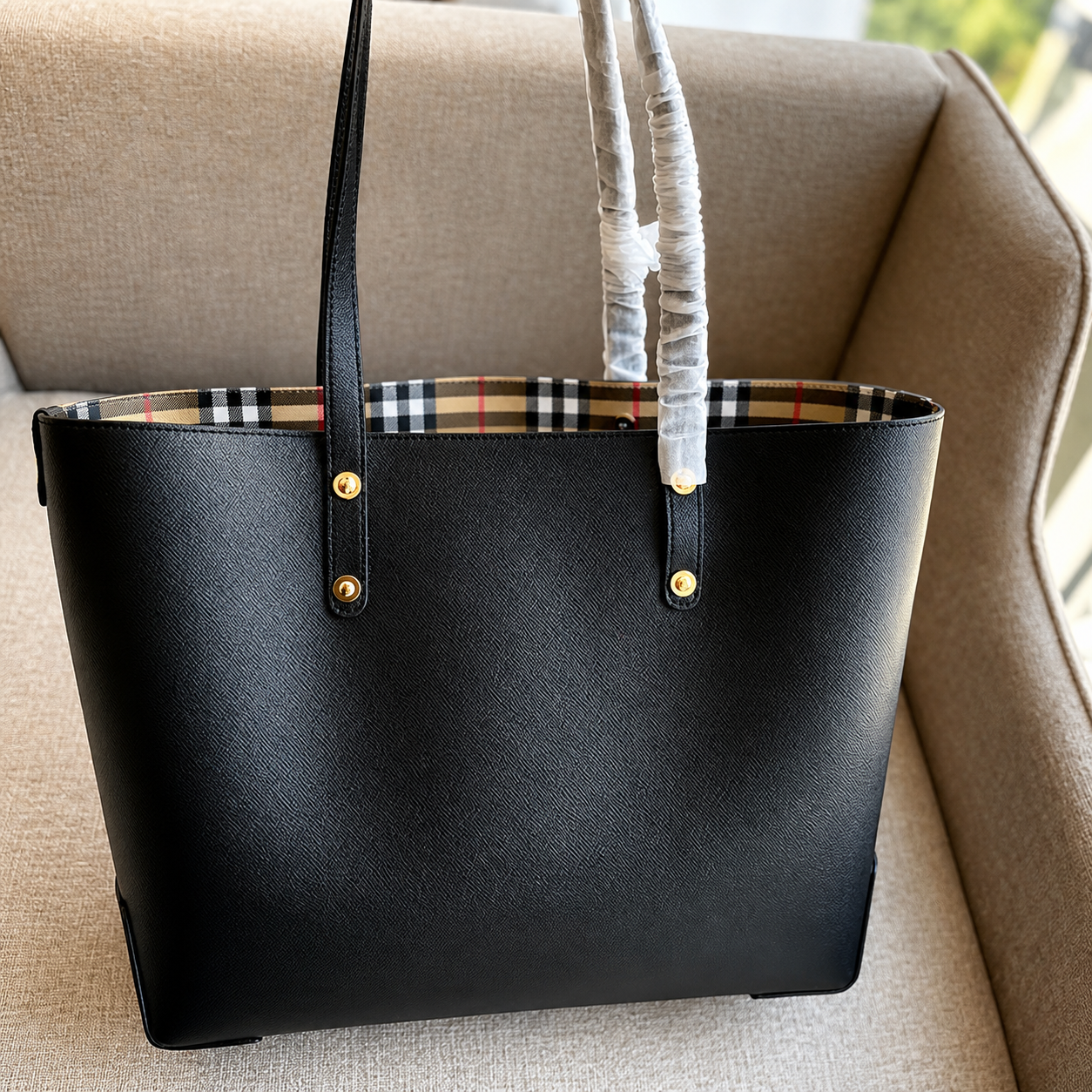 Burberry Embossed Logo Crest Leather Tote Bag