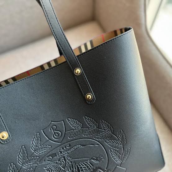 Burberry Embossed Logo Crest Leather Tote Bag