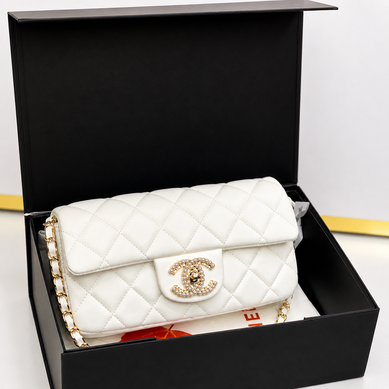 Chanel Classic Flap Mini Bag (Quilted Leather with Pearl CC Lock)