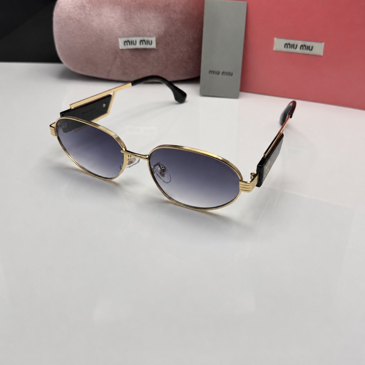 Miu Miu Luxe Oval Metal Sunglasses
