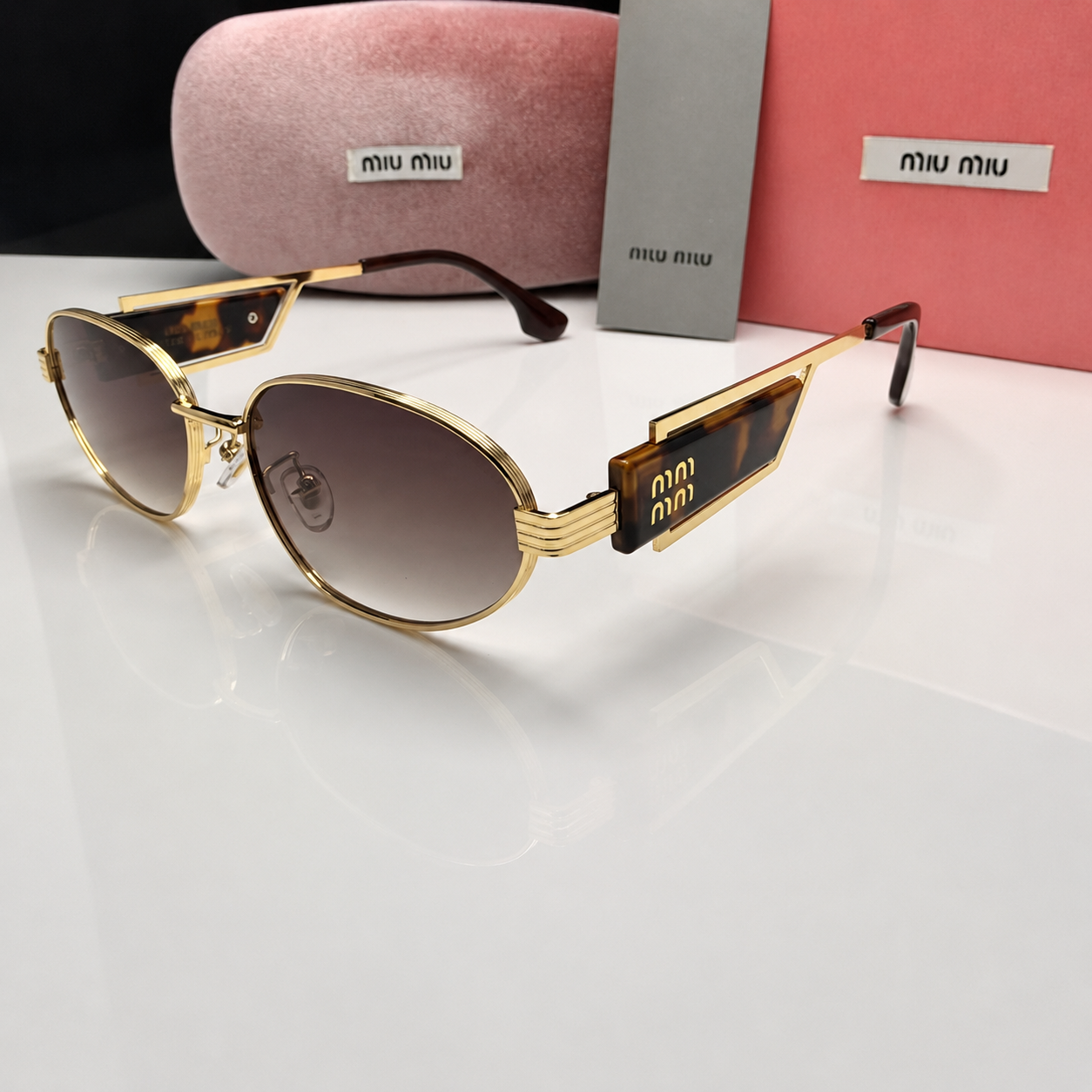 Miu Miu Luxe Oval Metal Sunglasses