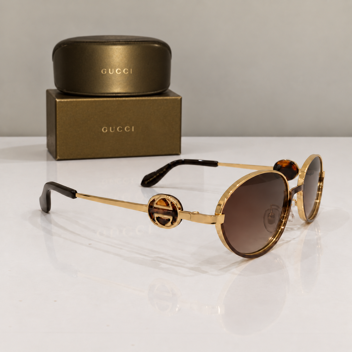 Gucci Gold Round Interlocking G Sunglasses