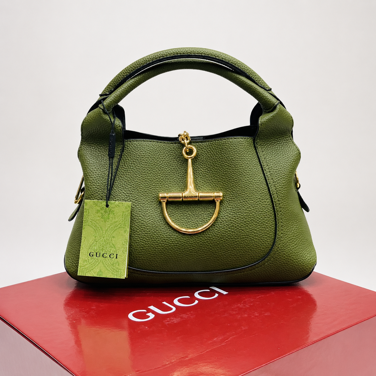 Gucci Stirrup Textured Leather Top Handle Bag