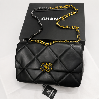 Chanel Signature Chain Quilted Flap Bag