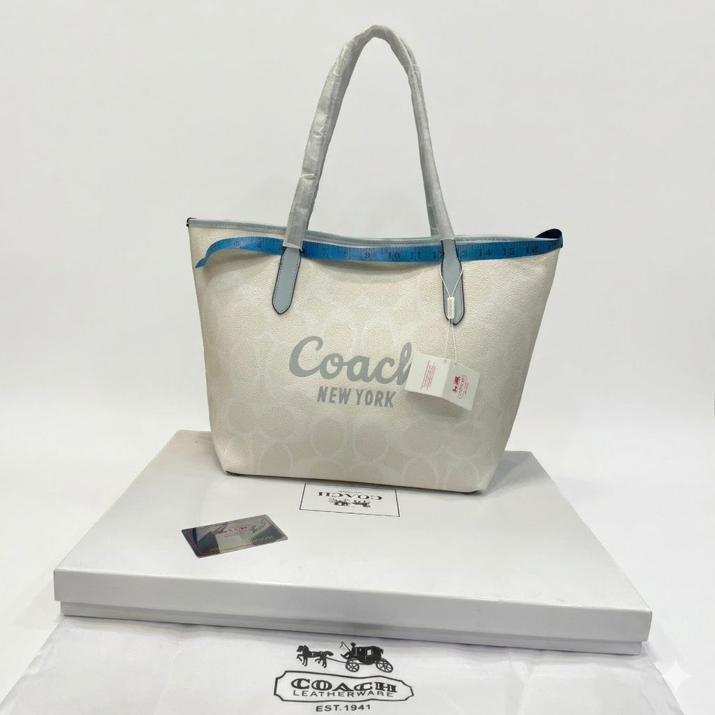 Coach City Tote in Signature Canvas with Coach Graphic