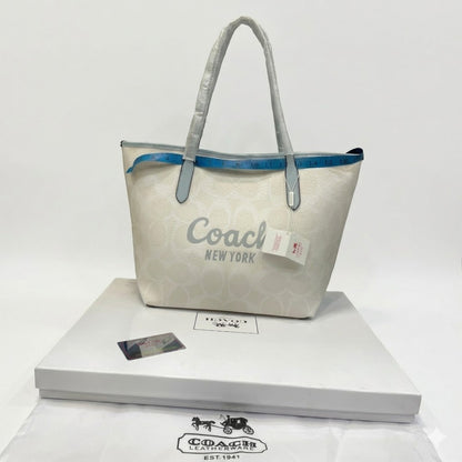 Coach City Tote in Signature Canvas with Coach Graphic