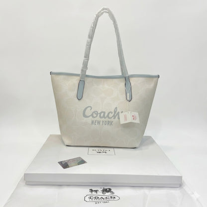 Coach City Tote in Signature Canvas with Coach Graphic