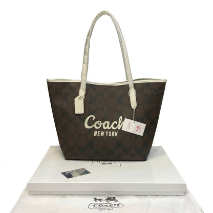 Coach City Tote in Signature Canvas with Coach Graphic