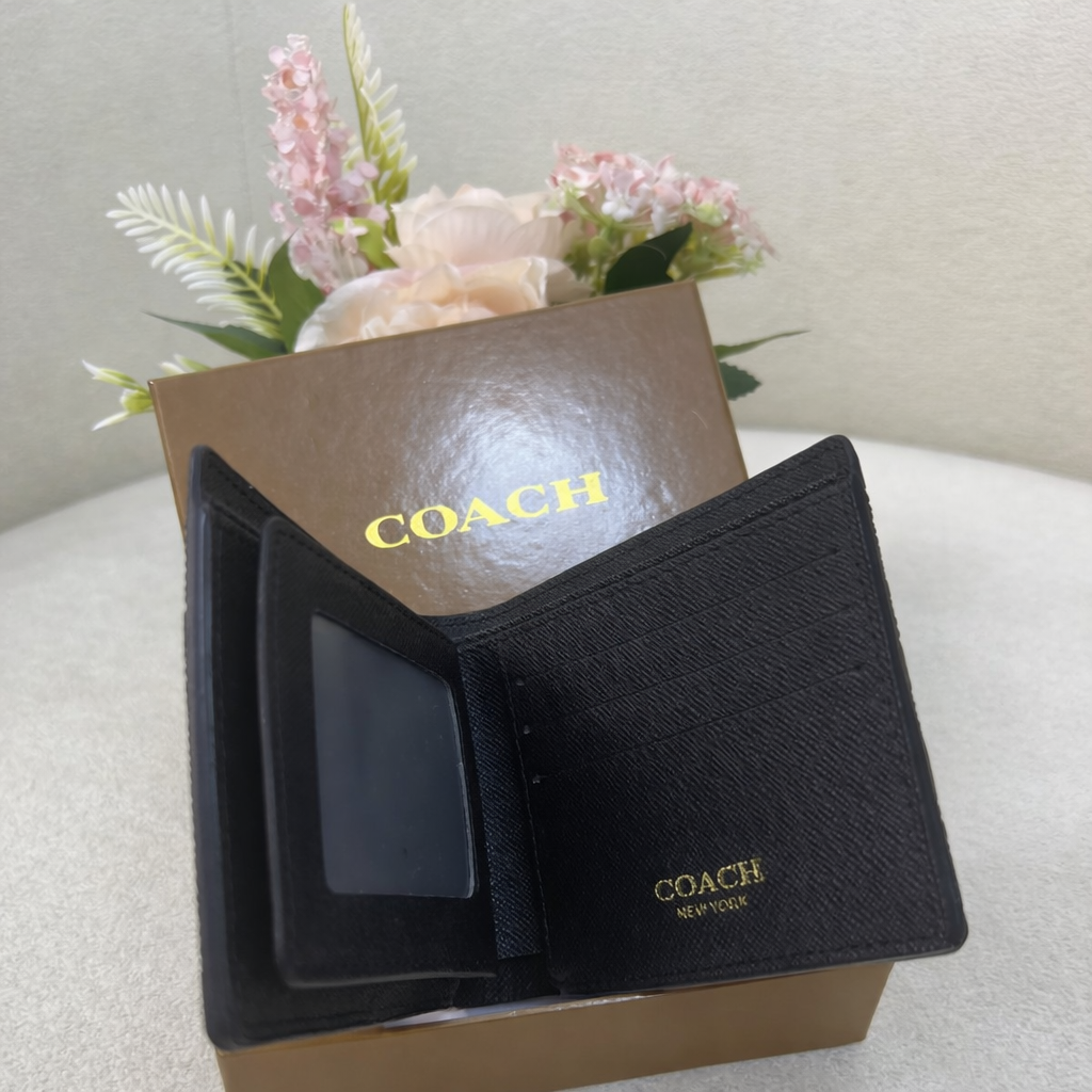Coach Embossed Monogram Wallet Style
