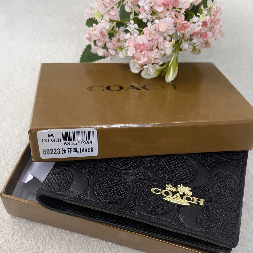 Coach Embossed Monogram Wallet Style