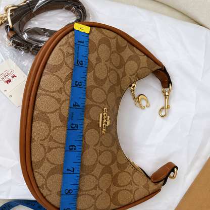 Coach Signature Monogram Crescent Shoulder Bag
