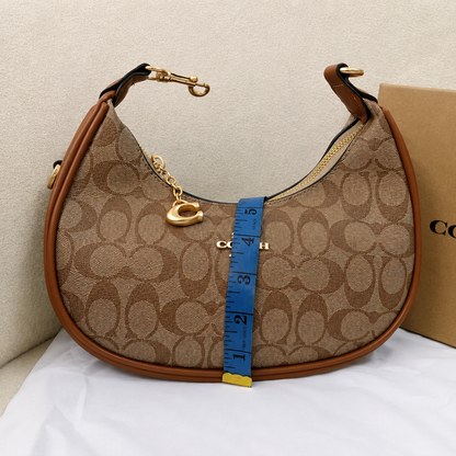 Coach Signature Monogram Crescent Shoulder Bag