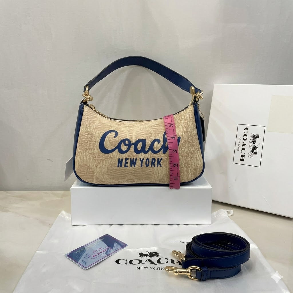 Coach Teri Mini Crossbody Bag in Signature Canvas with Coach Graphic
