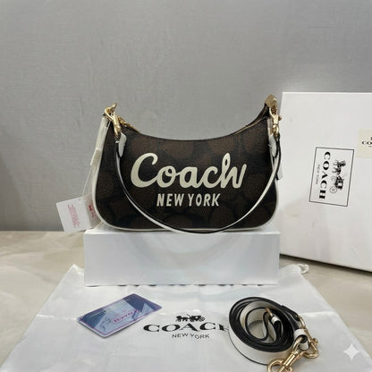 Coach Teri Mini Crossbody Bag in Signature Canvas with Coach Graphic