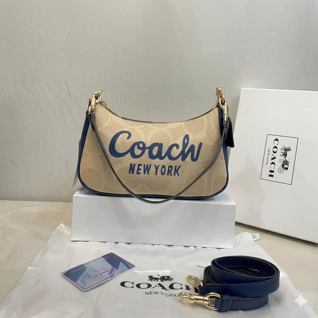 Coach Teri Mini Crossbody Bag in Signature Canvas with Coach Graphic