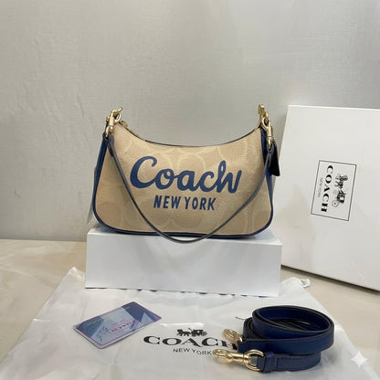 Coach Teri Mini Crossbody Bag in Signature Canvas with Coach Graphic