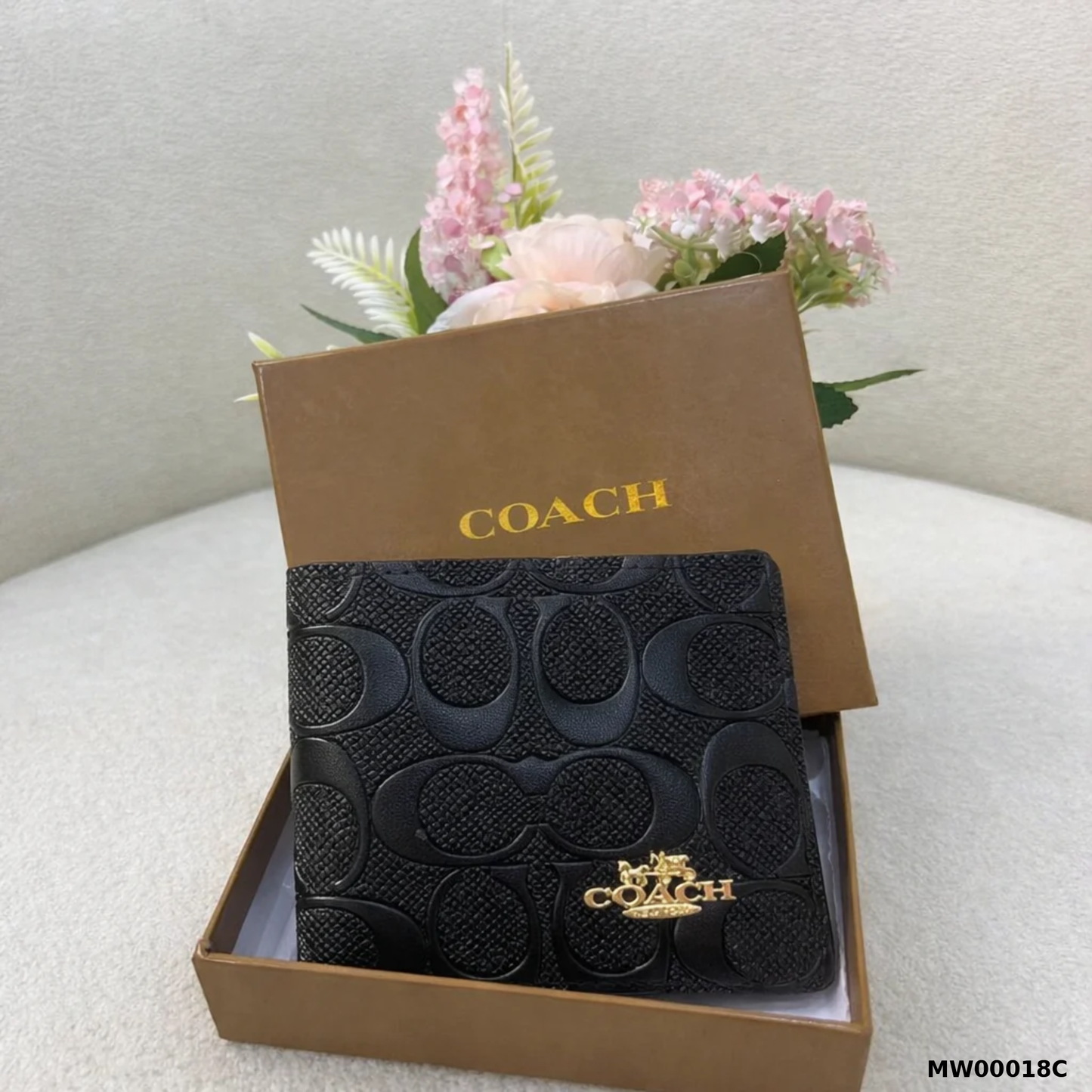 Coach Embossed Monogram Wallet Style