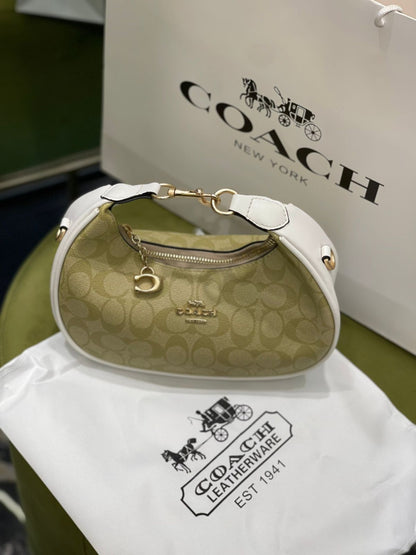 Coach Jonie Mini Bag in Signature Canvas