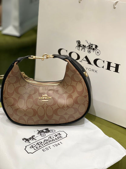 Coach Jonie Mini Bag in Signature Canvas