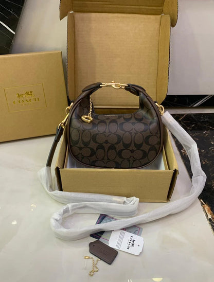Coach Jonie Mini Bag in Signature Canvas