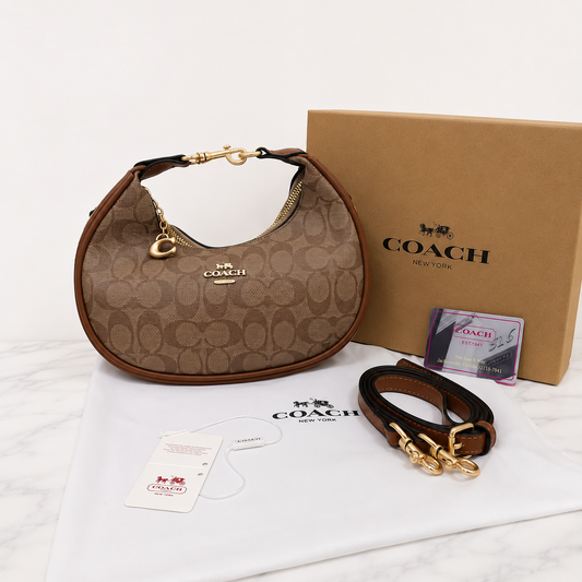 Coach Signature Monogram Crescent Shoulder Bag