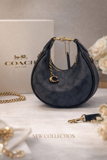 Coach Jonie Mini Bag in Signature Canvas
