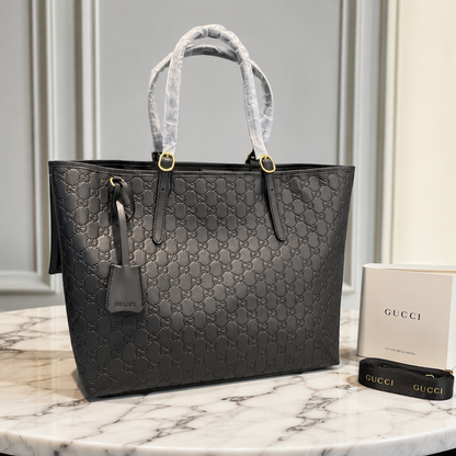 Gucci GG Emblem Debossed Leather Tote Bag