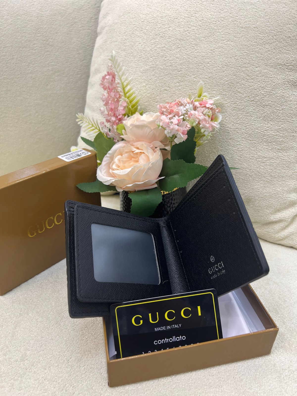 Gu-cci GG Embossed Leather Bi-Fold Wallet Style