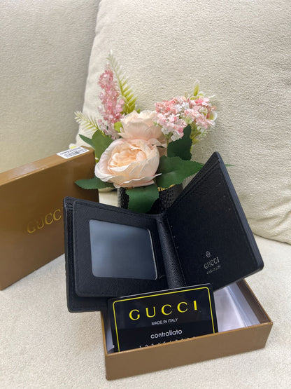 Gu-cci GG Embossed Leather Bi-Fold Wallet Style