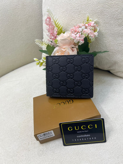 Gu-cci GG Embossed Leather Bi-Fold Wallet Style