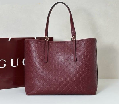 Gucci GG Embossed Leather Tote Bag