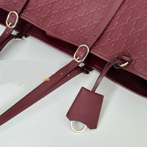 Gucci GG Embossed Leather Tote Bag