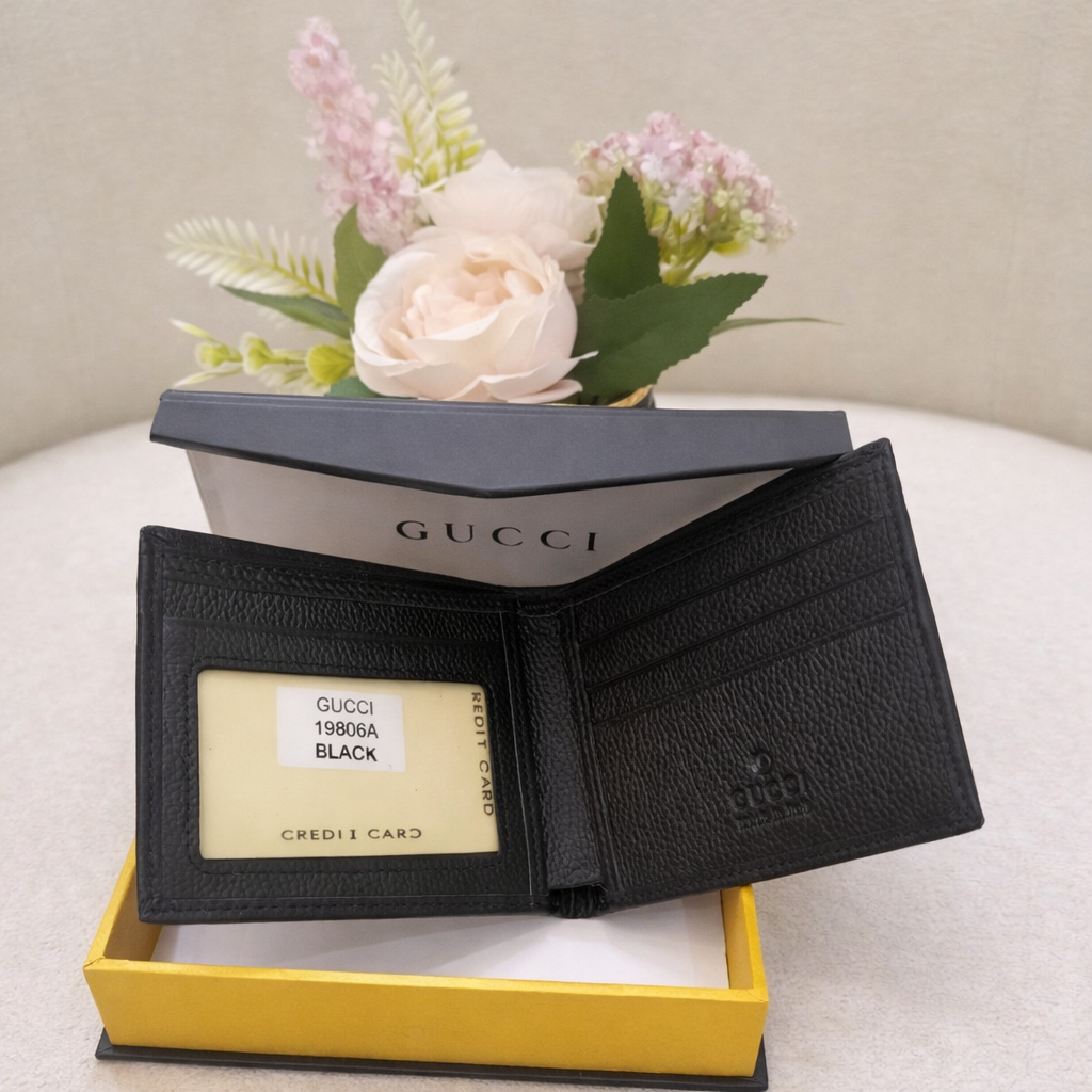 Gucci GG Embossed Leather Wallet