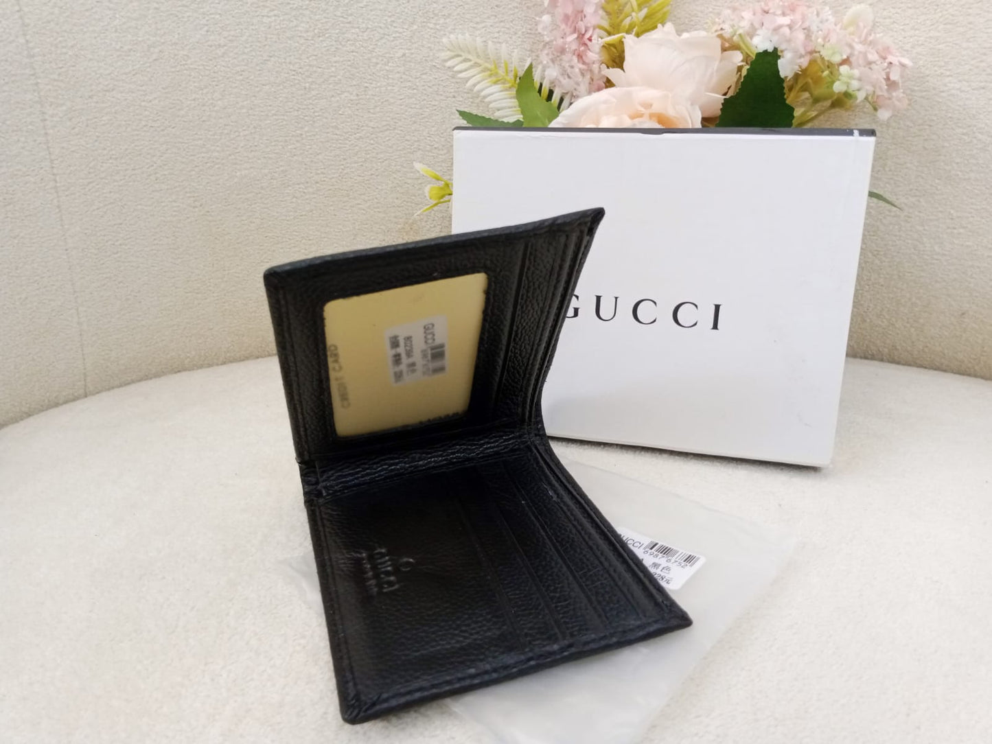 Gucci GG Embossed Premium Leather Bifold Wallet