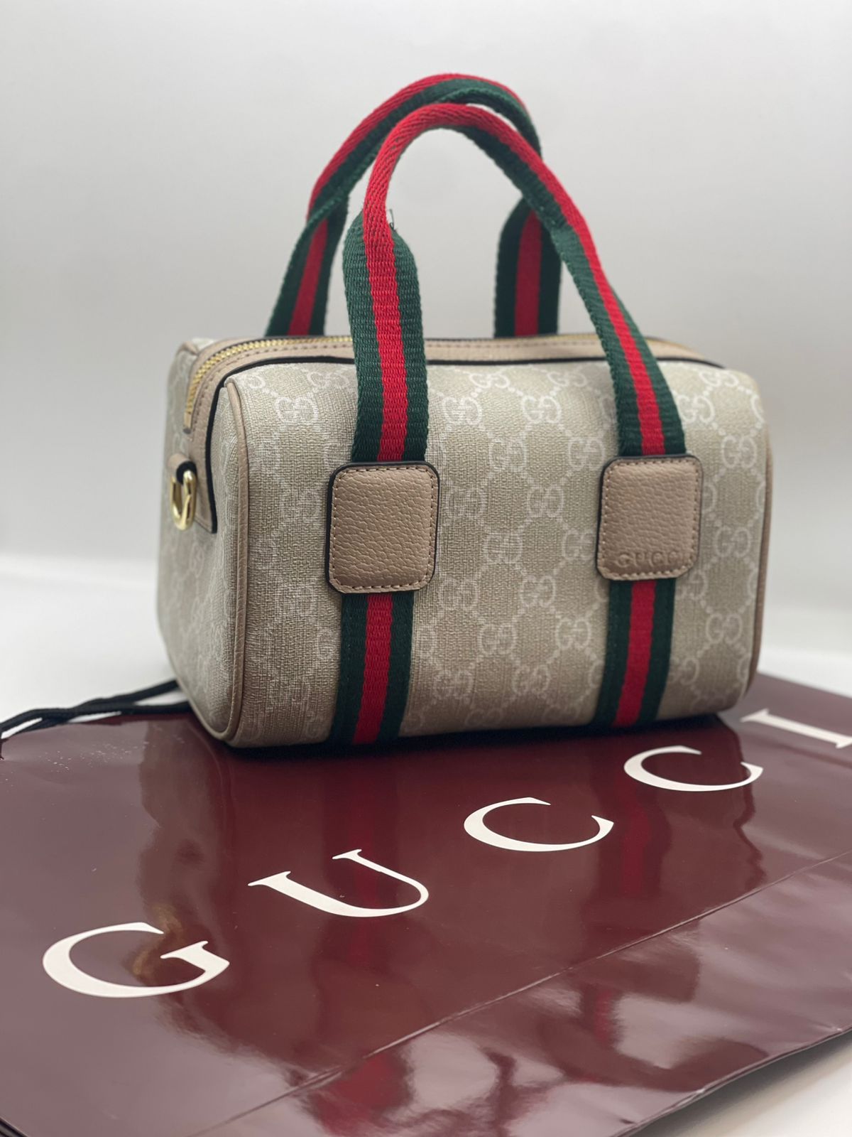 Gu-cci Mini GG Handbag (GG Supreme Canvas – Web Stripe)