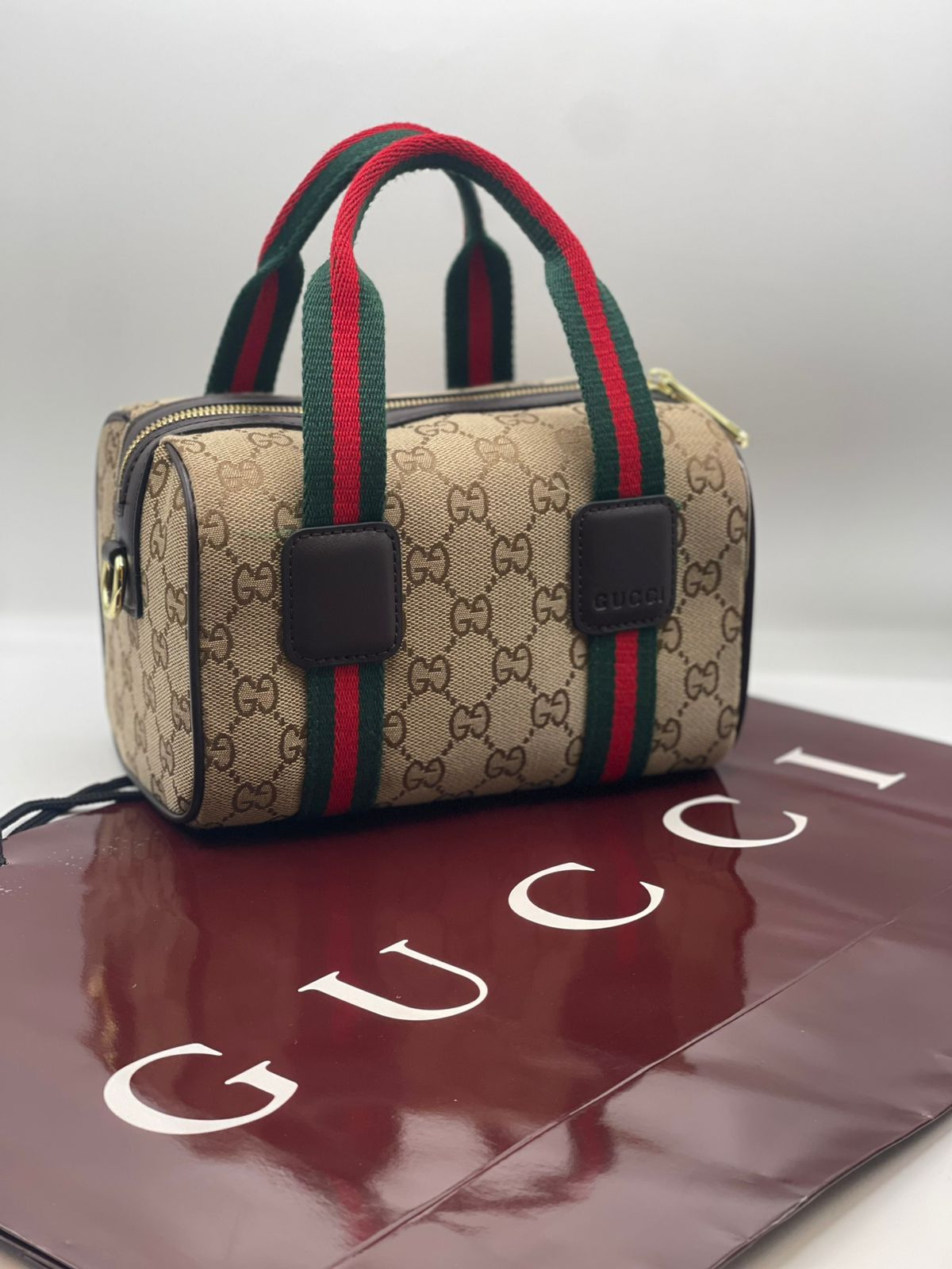 Gu-cci Mini GG Handbag (GG Supreme Canvas – Web Stripe)