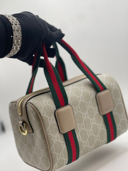 Gu-cci Mini GG Handbag (GG Supreme Canvas – Web Stripe)