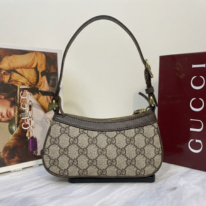 Gucci Ophidia Mini Shoulder Bag with the signature green and red Web stripe