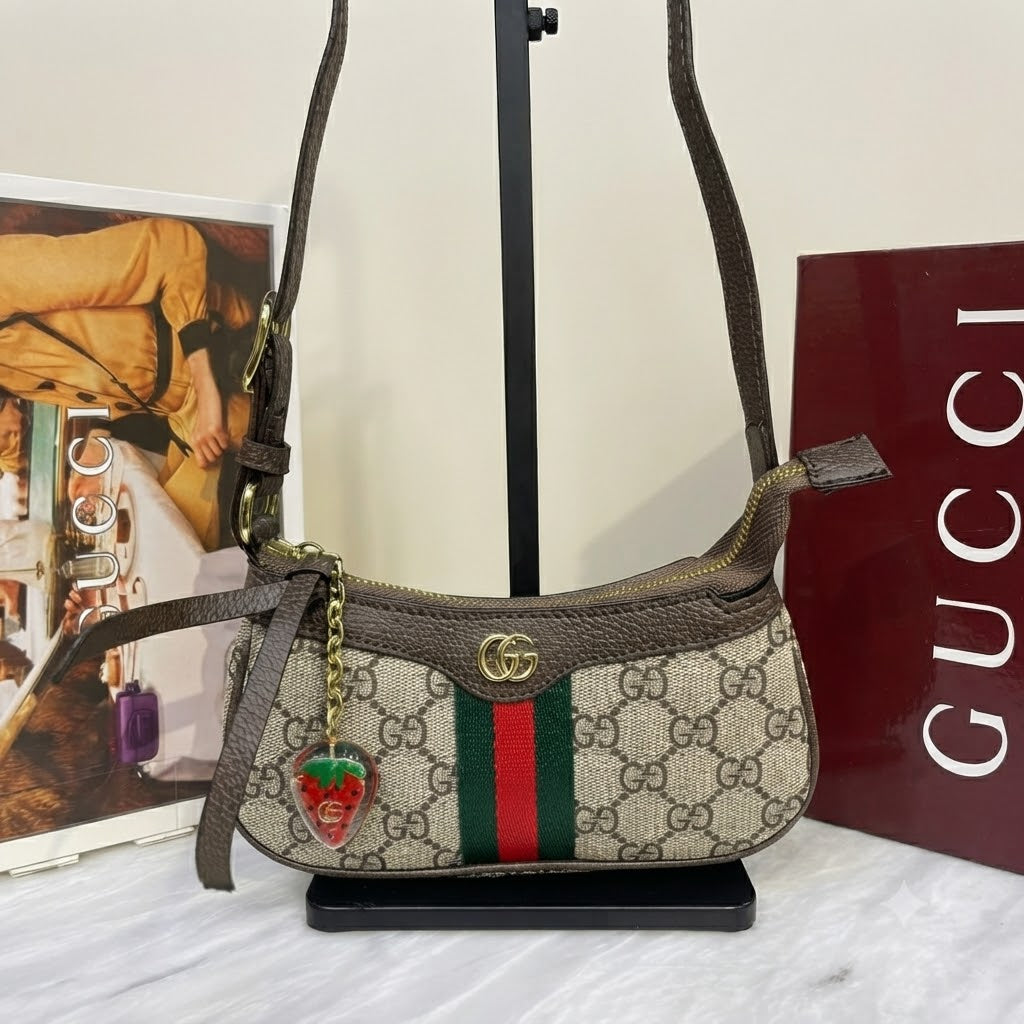 Gucci Ophidia Mini Shoulder Bag with the signature green and red Web stripe
