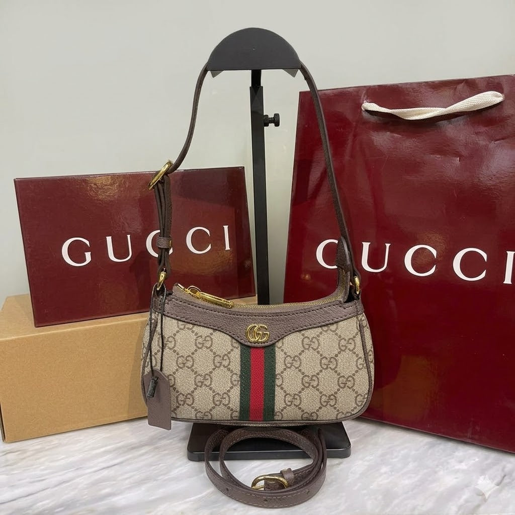 Gucci Ophidia Mini Shoulder Bag with the signature green and red Web stripe