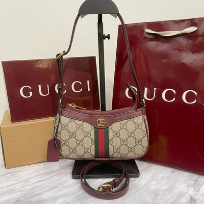Gucci Ophidia Mini Shoulder Bag with the signature green and red Web stripe