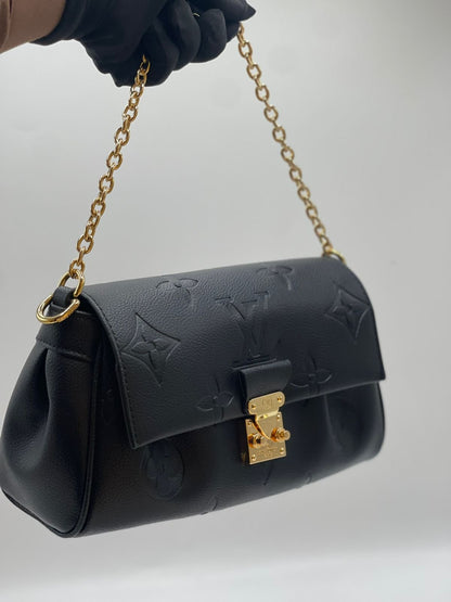 Louis Vuitton Pochette Métis East West Monogram Empreinte Leather