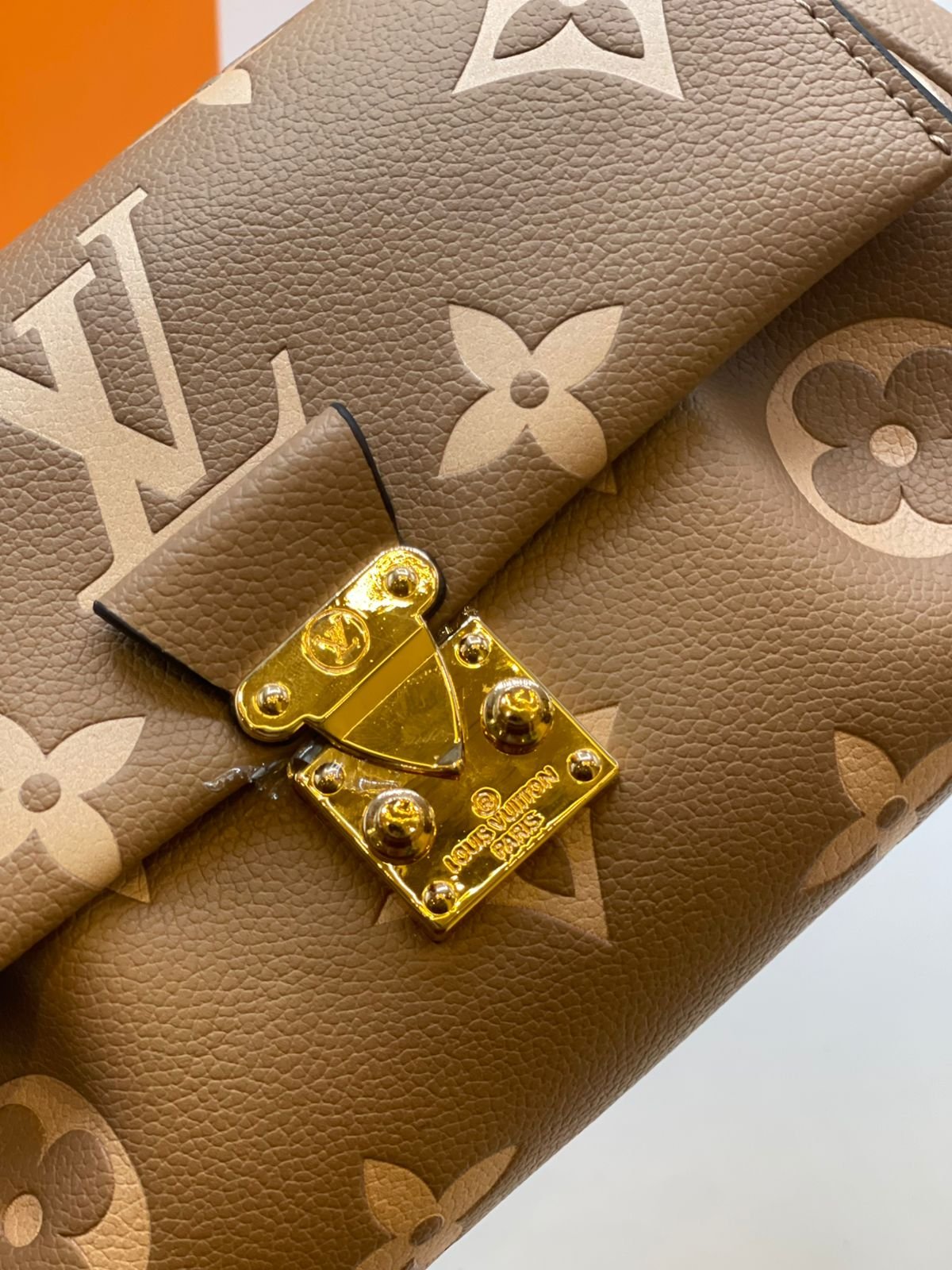 Louis Vuitton Pochette Métis East West Monogram Empreinte Leather