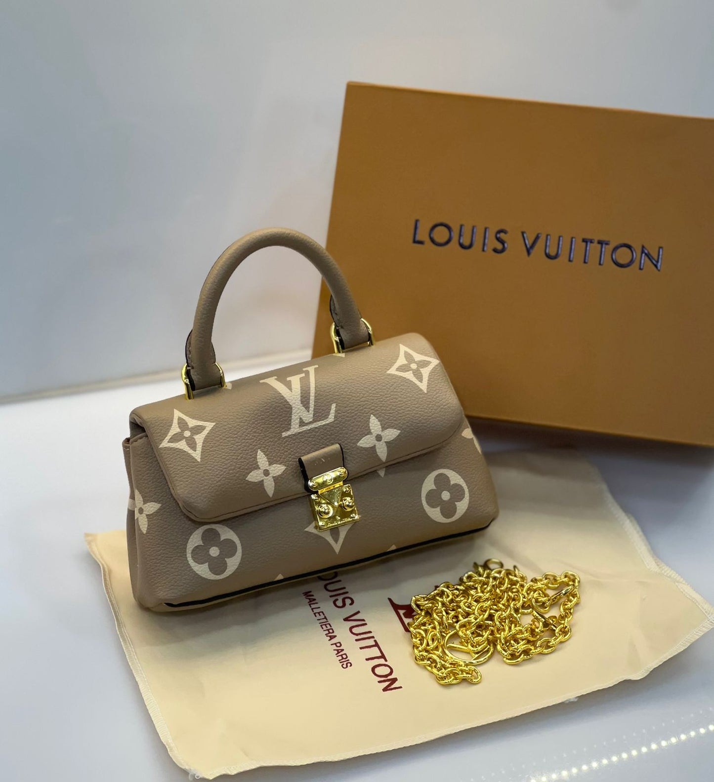 Lo-uis Vuitton Madeleine Bicolor Monogram Empreinte