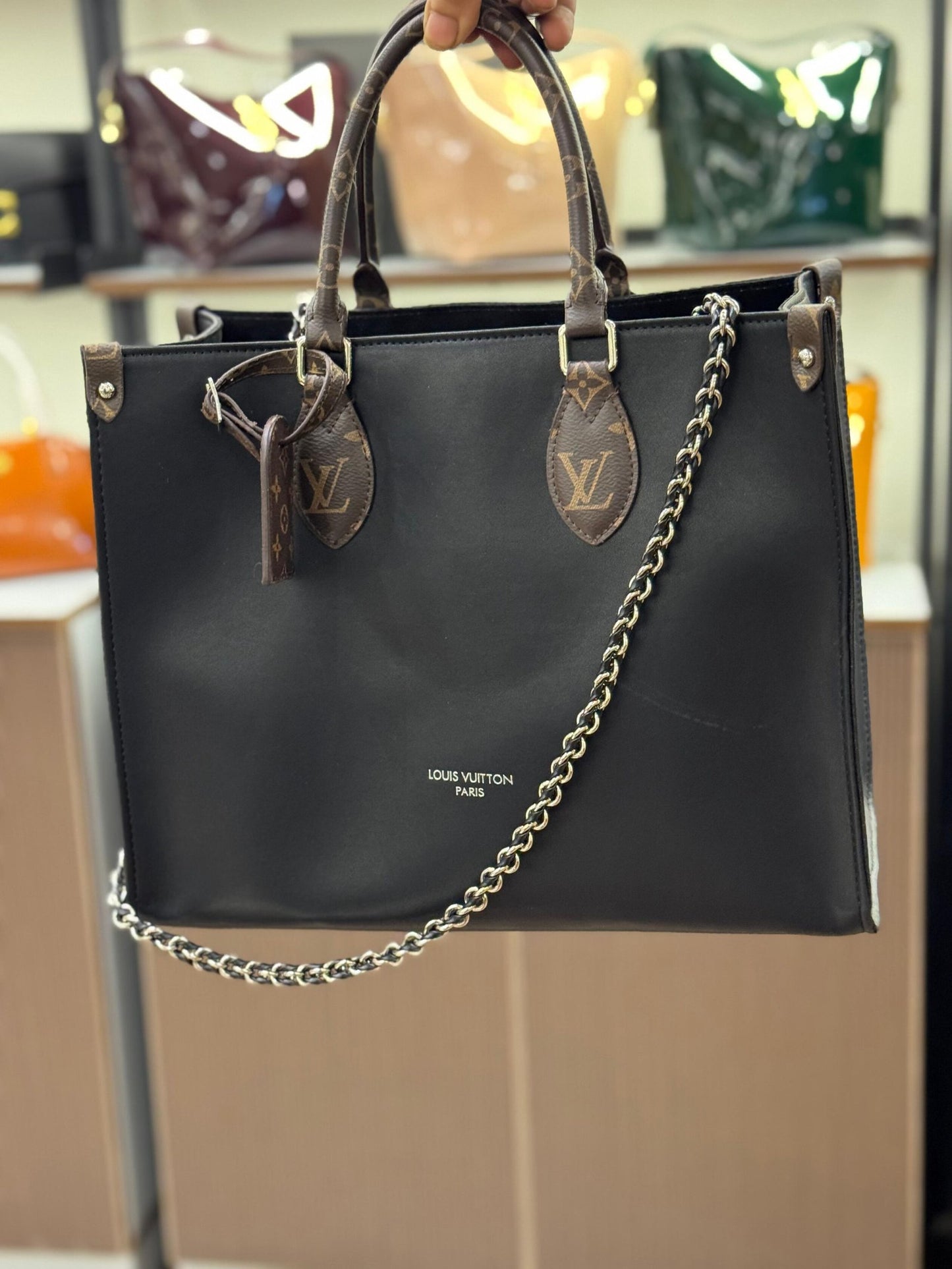 Louis Vuitton OnTheGo MM (Black Leather with Monogram Trim & Chain Strap)